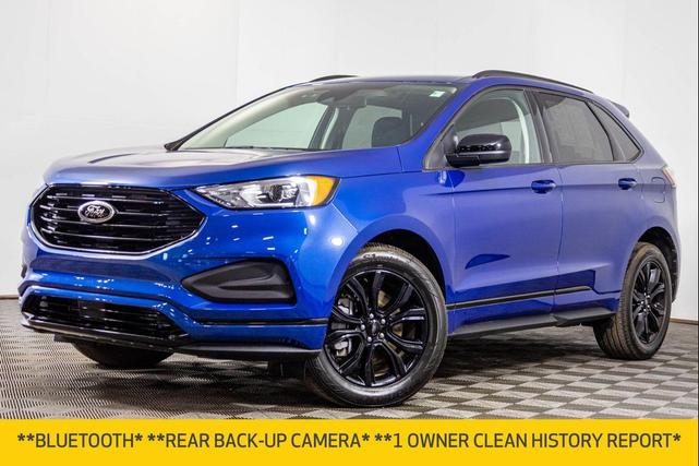 Photo of 2024 Atlas Blue Metallic Ford Edge