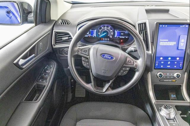Photo of 2024 Atlas Blue Metallic Ford Edge