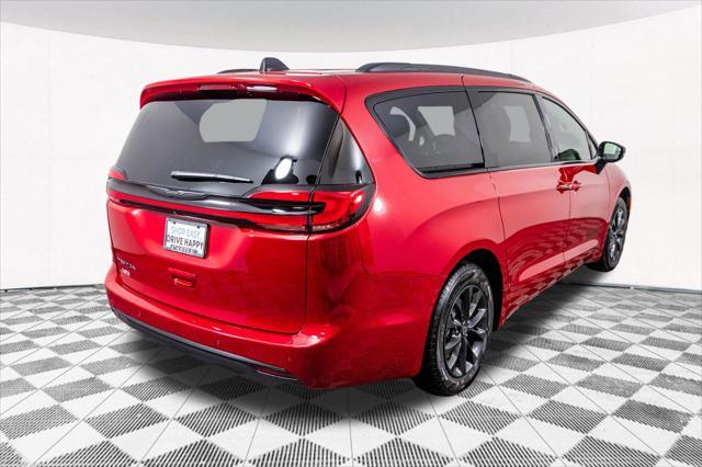 Photo of 2025 Red Hot Pearlcoat Chrysler Pacifica