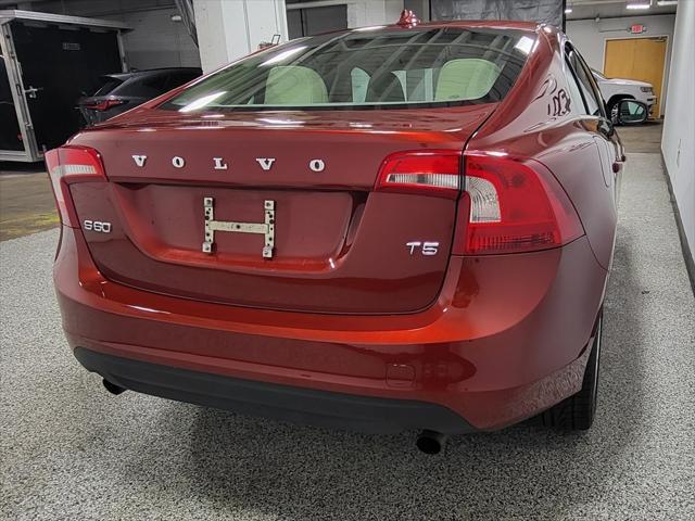 Photo of 2012 Flamenco Red Metallic Volvo S60