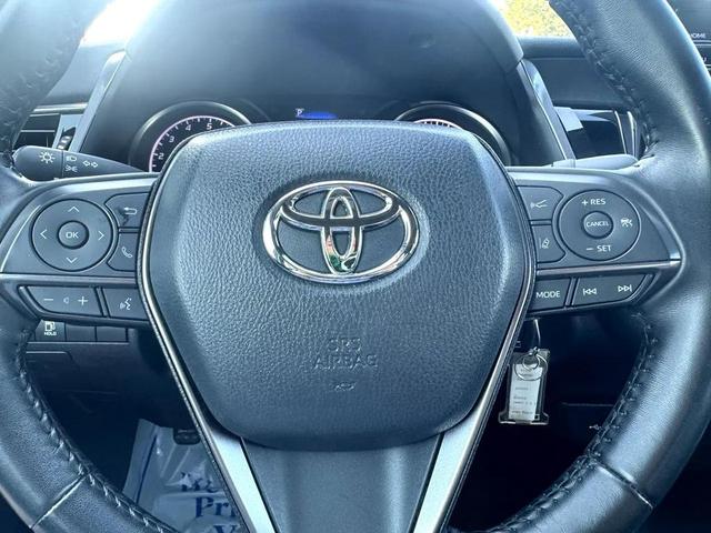 Photo of 2024 Midnight Black Metallic Toyota Camry