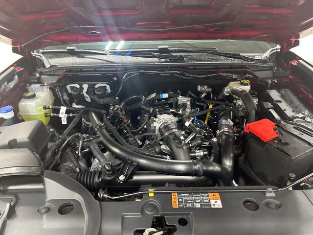 Photo of 2025 Ruby Red Metallic Tinted Clearcoat Ford Ranger