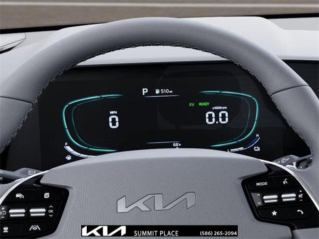 Photo of 2025 Cityscape Green Kia Niro