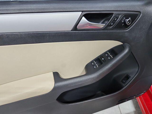Photo of 2013 Tornado Red Volkswagen Jetta