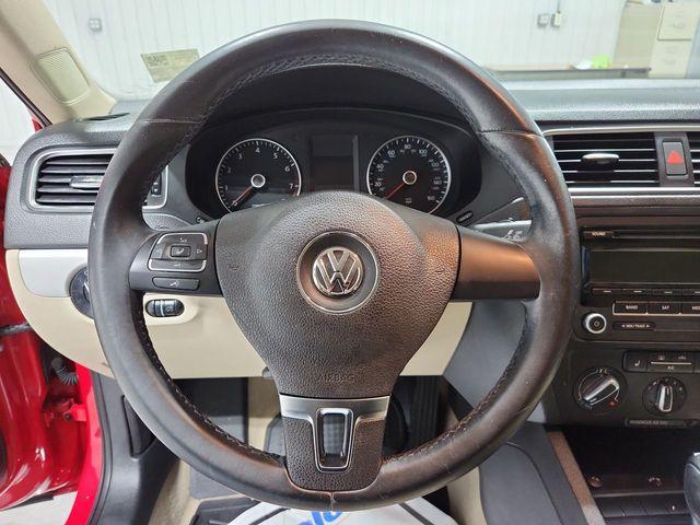 Photo of 2013 Tornado Red Volkswagen Jetta