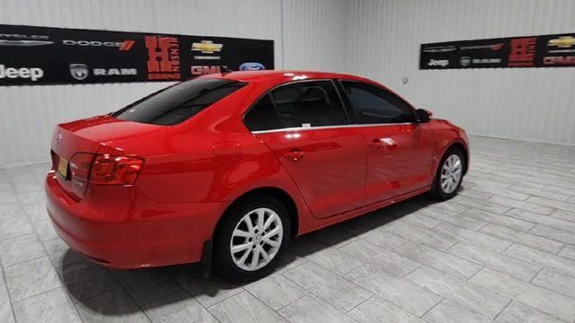 Photo of 2013 Tornado Red Volkswagen Jetta