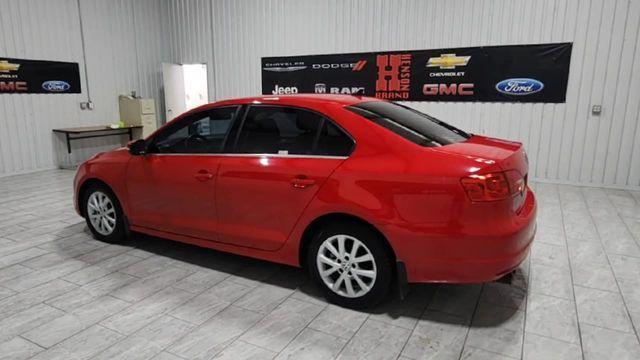 Photo of 2013 Tornado Red Volkswagen Jetta