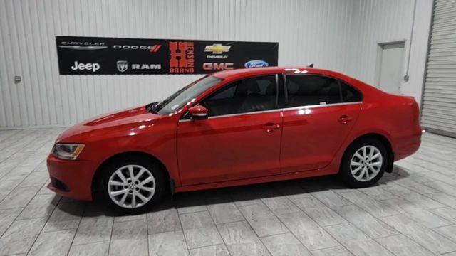 Photo of 2013 Tornado Red Volkswagen Jetta