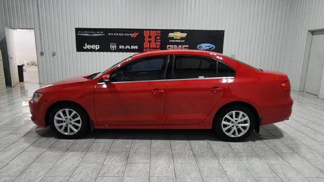 Photo of 2013 Tornado Red Volkswagen Jetta