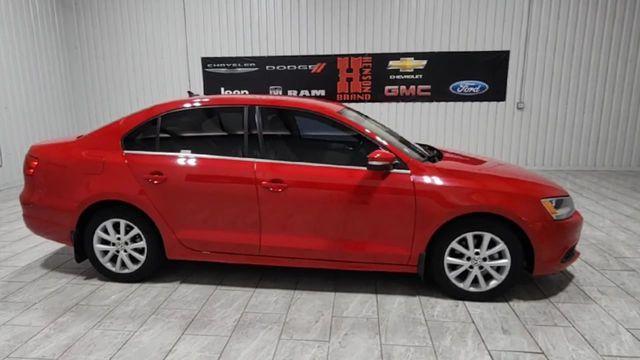 Photo of 2013 Tornado Red Volkswagen Jetta