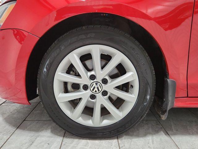 Photo of 2013 Tornado Red Volkswagen Jetta