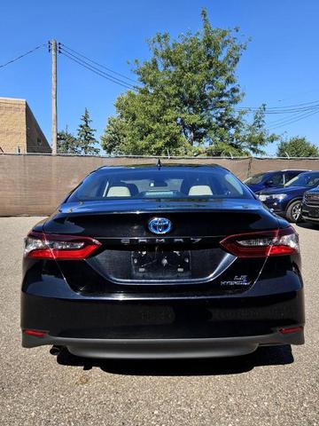 Photo of 2021 Black Toyota Camry Hybrid