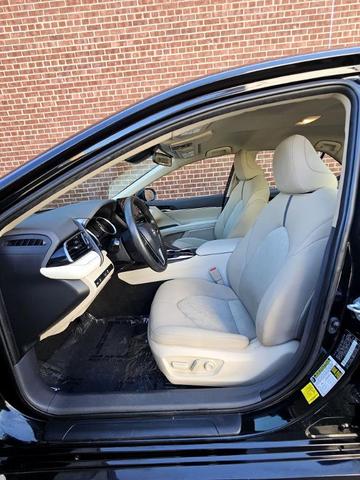 Photo of 2021 Black Toyota Camry Hybrid