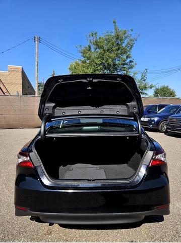 Photo of 2021 Black Toyota Camry Hybrid