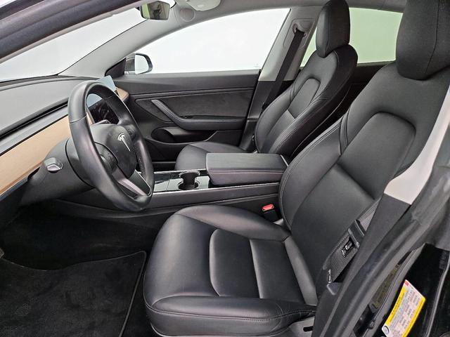 Photo of 2018 Black Tesla Model 3
