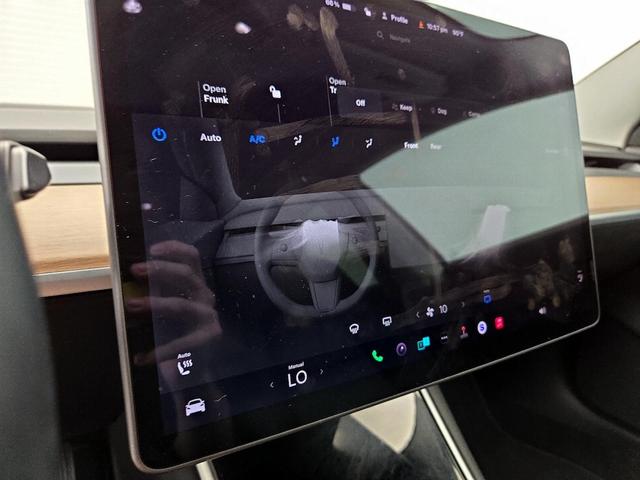 Photo of 2018 Black Tesla Model 3