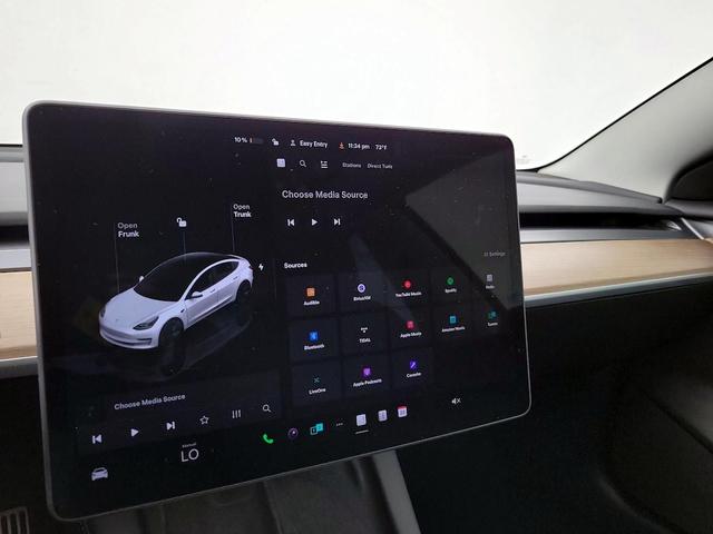 Photo of 2023 White Tesla Model 3