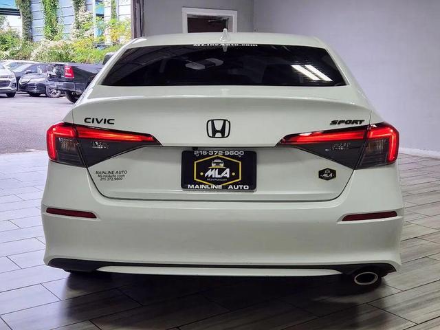 Photo of 2024 Platinum White Pearl Honda Civic