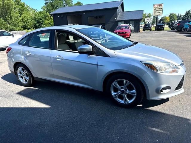 Photo of 2014 Ingot Silver Metallic Ford Focus