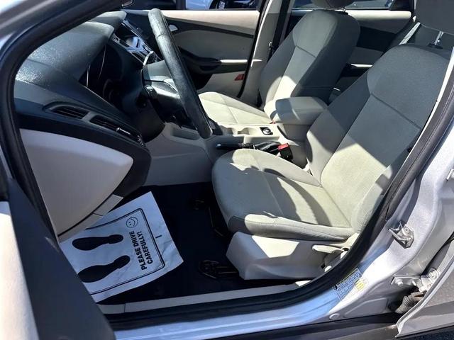 Photo of 2014 Ingot Silver Metallic Ford Focus