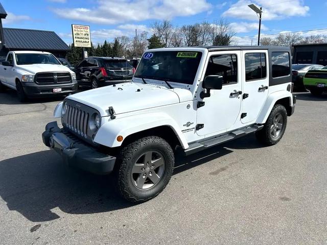 Photo of 2015 Bright White Clearcoat Jeep Wrangler Unlimited