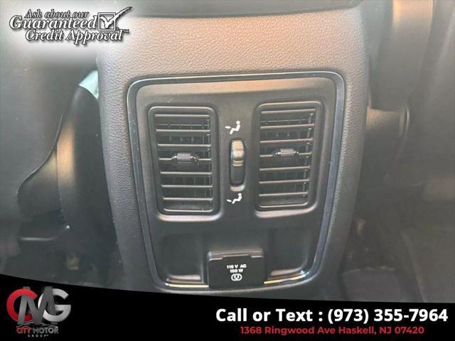 Photo of 2021 Diamond Black Crystal Pearlcoat Jeep Grand Cherokee