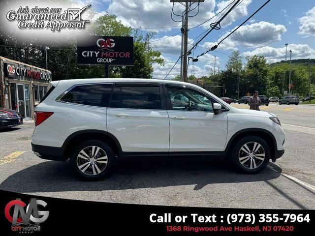 Photo of 2018 White Diamond Pearl Honda Pilot