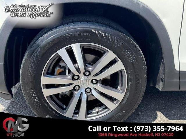 Photo of 2018 White Diamond Pearl Honda Pilot