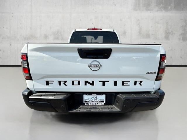 Photo of 2023 Glacier White Nissan Frontier