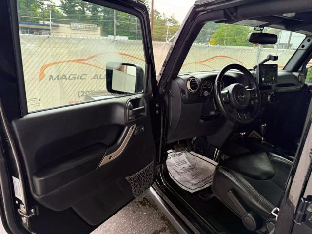 Photo of 2017 Black Clearcoat Jeep Wrangler Unlimited