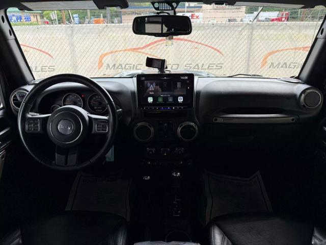 Photo of 2017 Black Clearcoat Jeep Wrangler Unlimited