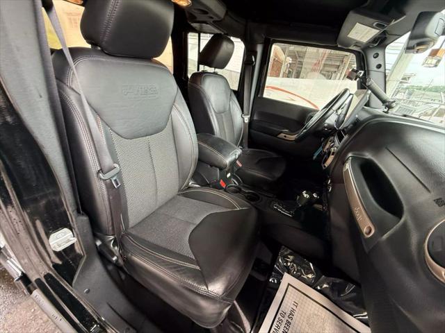 Photo of 2017 Black Clearcoat Jeep Wrangler Unlimited