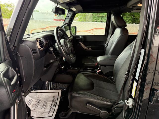 Photo of 2017 Black Clearcoat Jeep Wrangler Unlimited