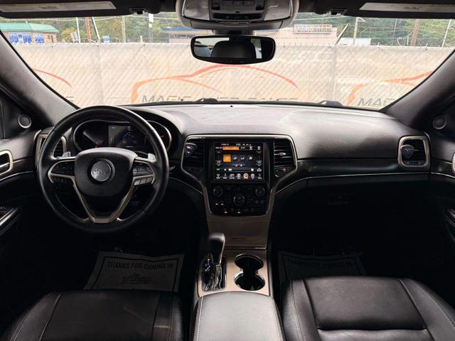 Photo of 2017 Luxury Brown Pearlcoat Jeep Grand Cherokee