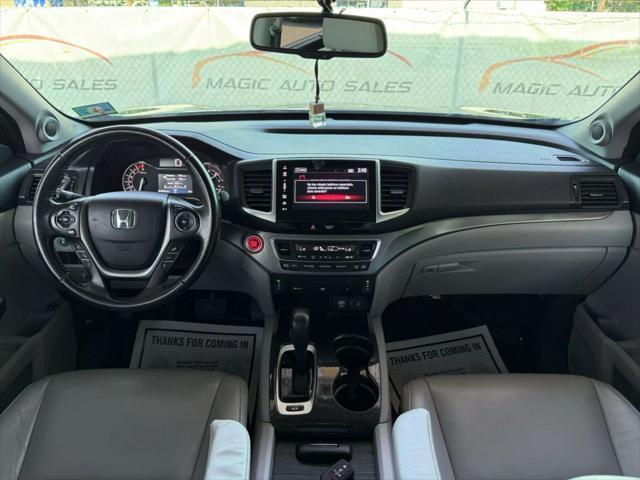 Photo of 2018 Crystal Black Pearl Honda Pilot
