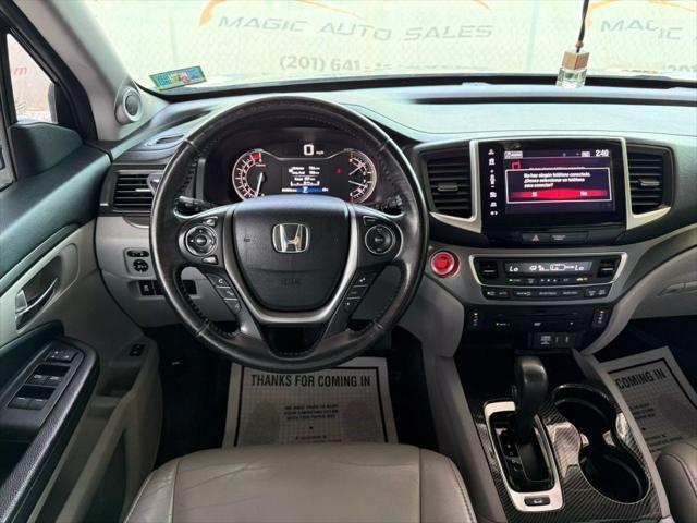 Photo of 2018 Crystal Black Pearl Honda Pilot
