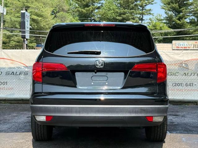 Photo of 2018 Crystal Black Pearl Honda Pilot