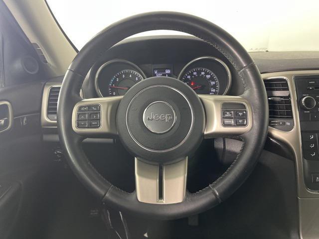 Photo of 2013 Deep Cherry Red Crystal Pearlcoat Jeep Grand Cherokee