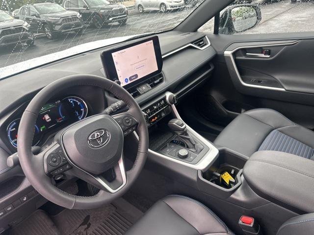 Photo of 2024 Wind Chill Pearl/Midnight Black Metallic Toyota RAV4 Hybrid