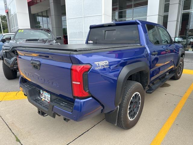 Photo of 2024 Blue Crush Metallic Toyota Tacoma