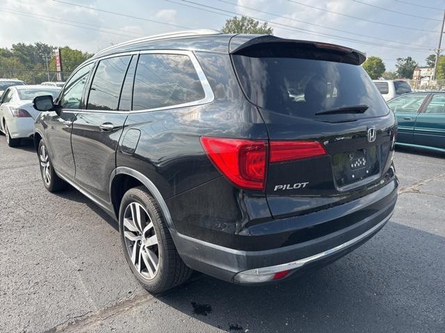 Photo of 2016 Crystal Black Pearl Honda Pilot