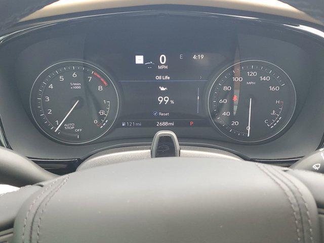 Photo of 2024 Crystal White Tricoat Cadillac XT6