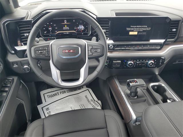 Photo of 2025 Summit White GMC Sierra 1500