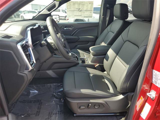 Photo of 2025 Volcanic Red Tintcoat GMC Canyon