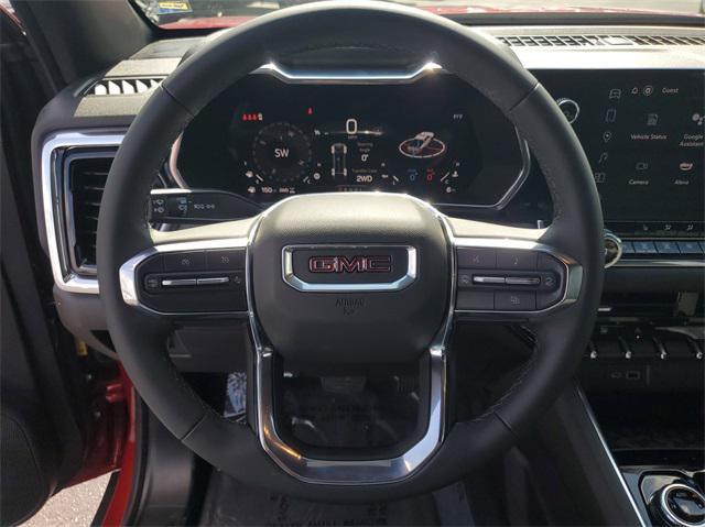 Photo of 2025 Volcanic Red Tintcoat GMC Canyon