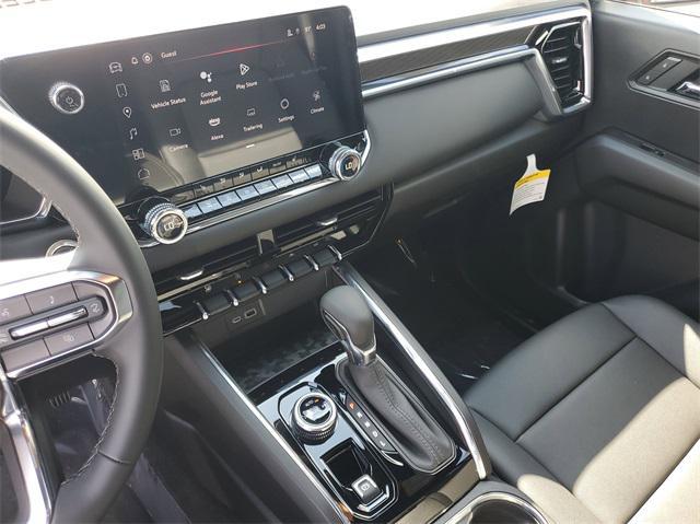 Photo of 2025 Volcanic Red Tintcoat GMC Canyon
