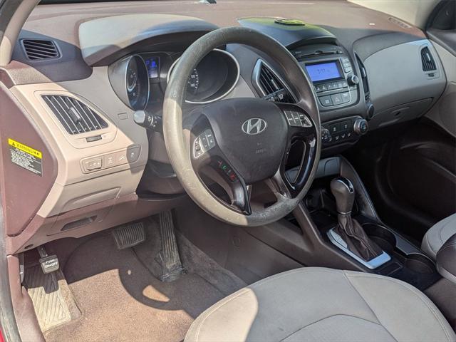 Photo of 2014 Garnet Red Hyundai TUCSON