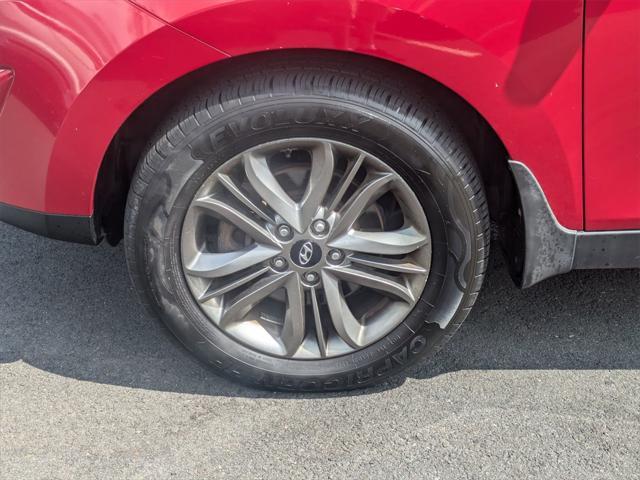 Photo of 2014 Garnet Red Hyundai TUCSON