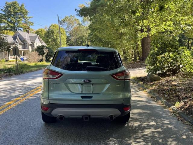 Photo of 2013 Turquoise Ford Escape