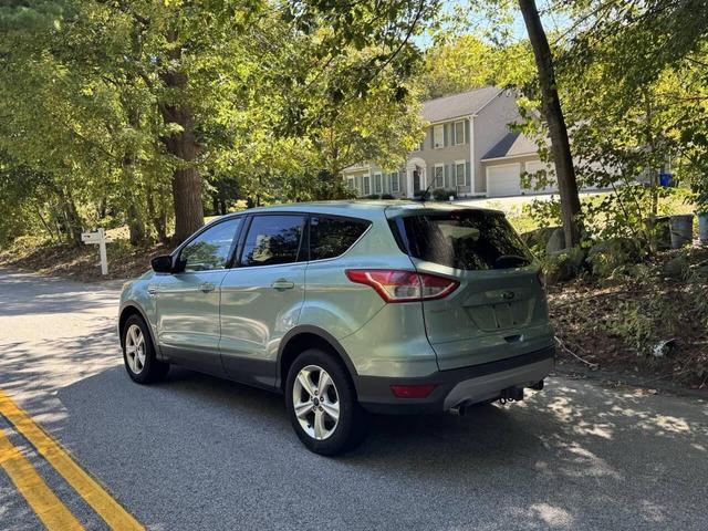 Photo of 2013 Turquoise Ford Escape